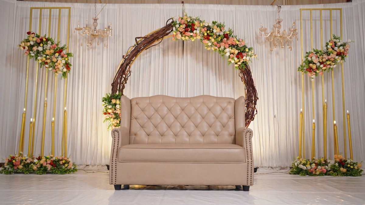 Flower decoration for events in Hyderabad: stage framed in white roses, jasmine and orchids