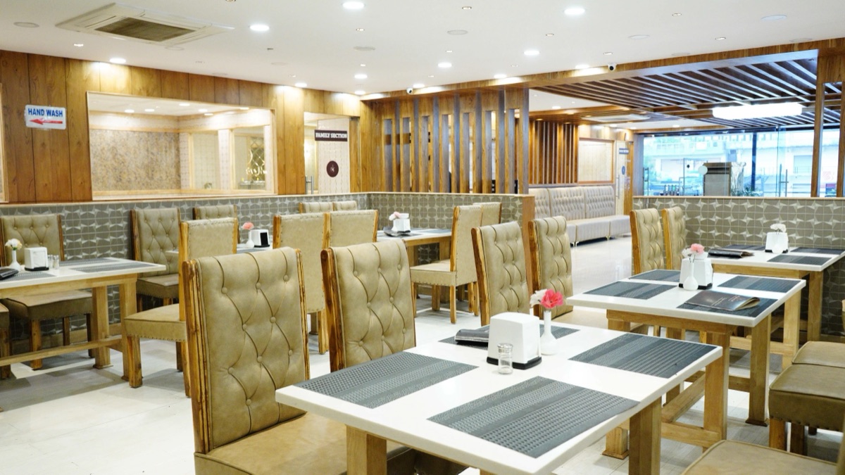 Family dining hall at Mubarak Restaurant Medchal with set tables ready for the evening rush